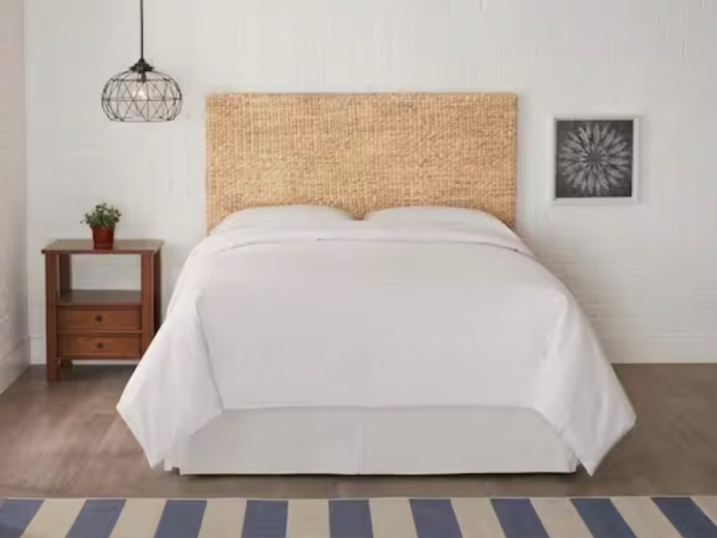 natural caspian headboard on bed with white comforter in bedroom