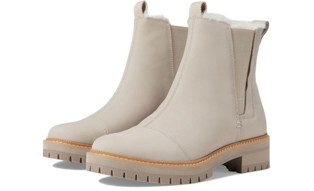 toms dakota leather boot in pebble grey color with white background 