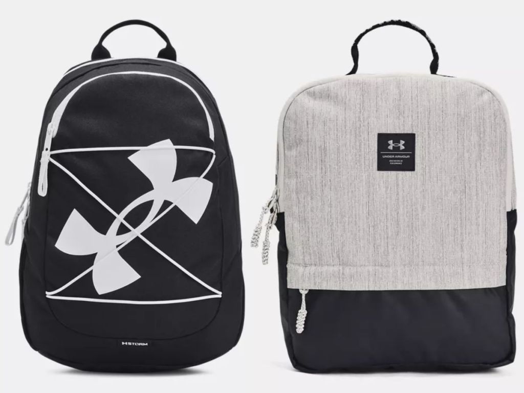a black and white Under Armour backpack and a cream and black Under Armour backpack