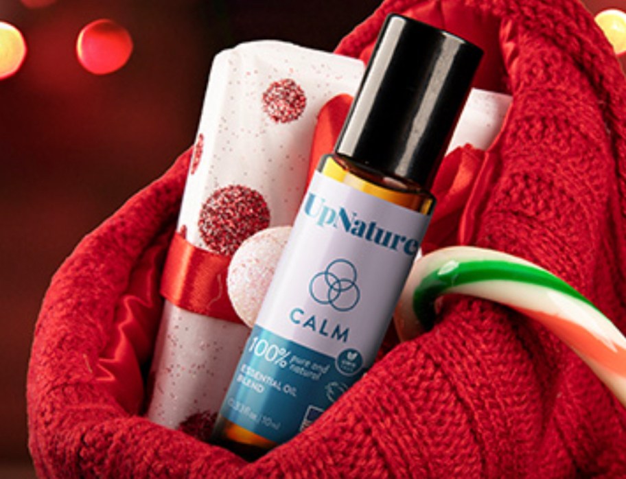 up nature calm roller in red stocking with candy cane and gift