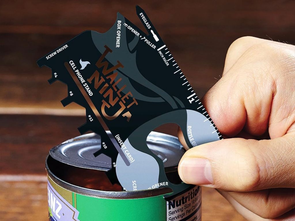 using a credit card multitool to open a can