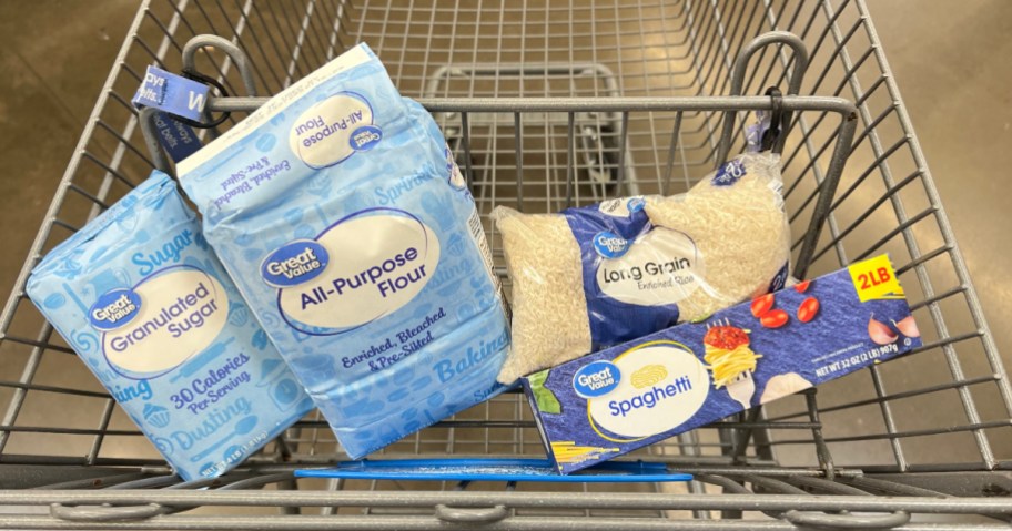 shopping cart with flour, sugar, rice, and spaghetti