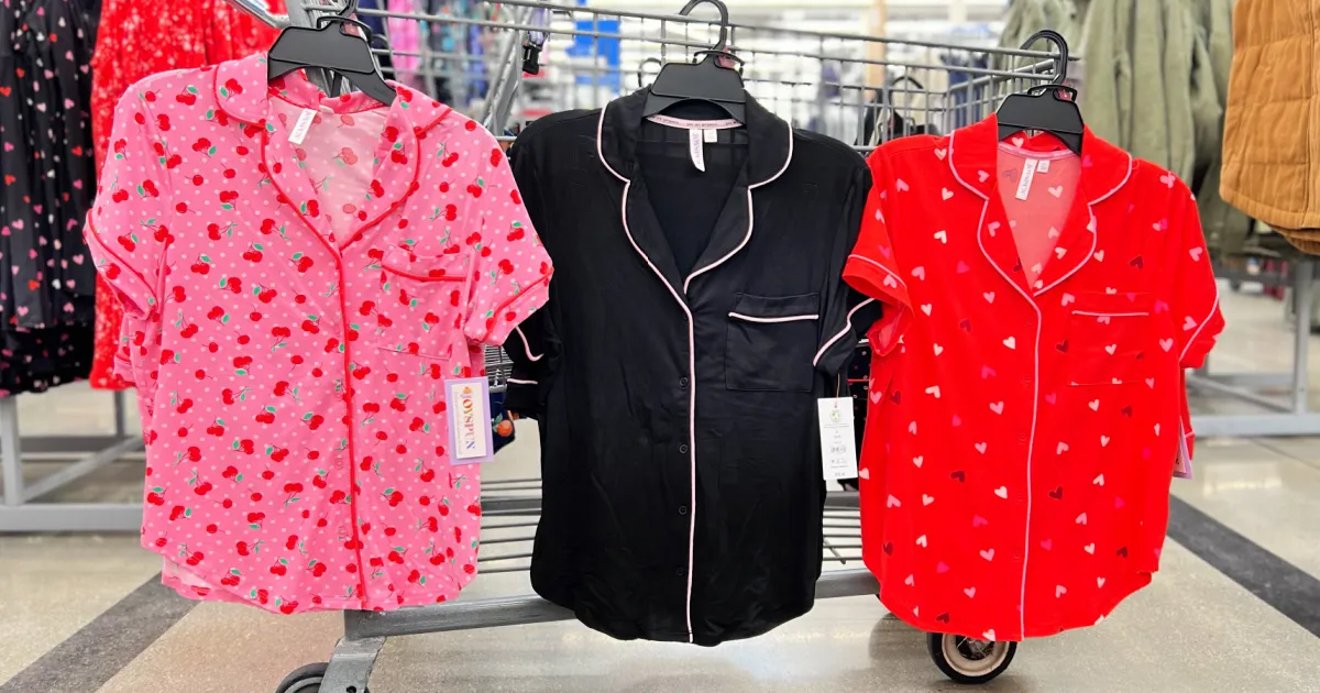 pink, black and red pajamas hanging on walmart shopping cart