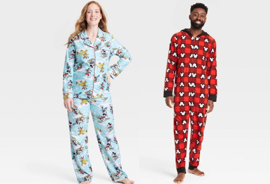 woman wearing two piece disney pajama and man wearing onesie