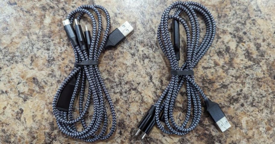 pair of multi-end 3-in-1 usb charging cables laying on counter