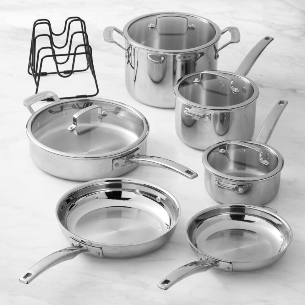 11 piece stainless steel cookware set with pot lid rack on counter