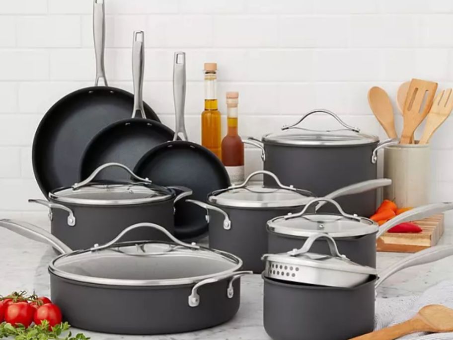 set of dark grey cookware on kitchen counter