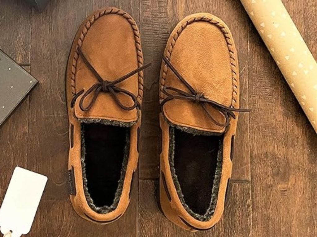 pair of men's Dearfoams moccasin style slippers in brown