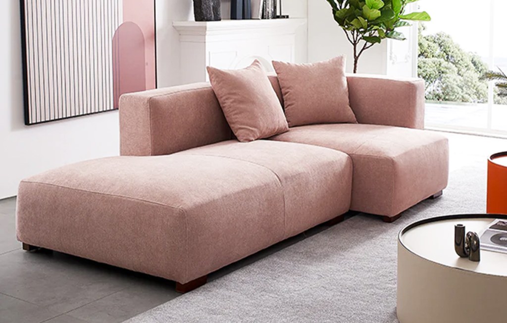 light pink l-shaped couch in living room
