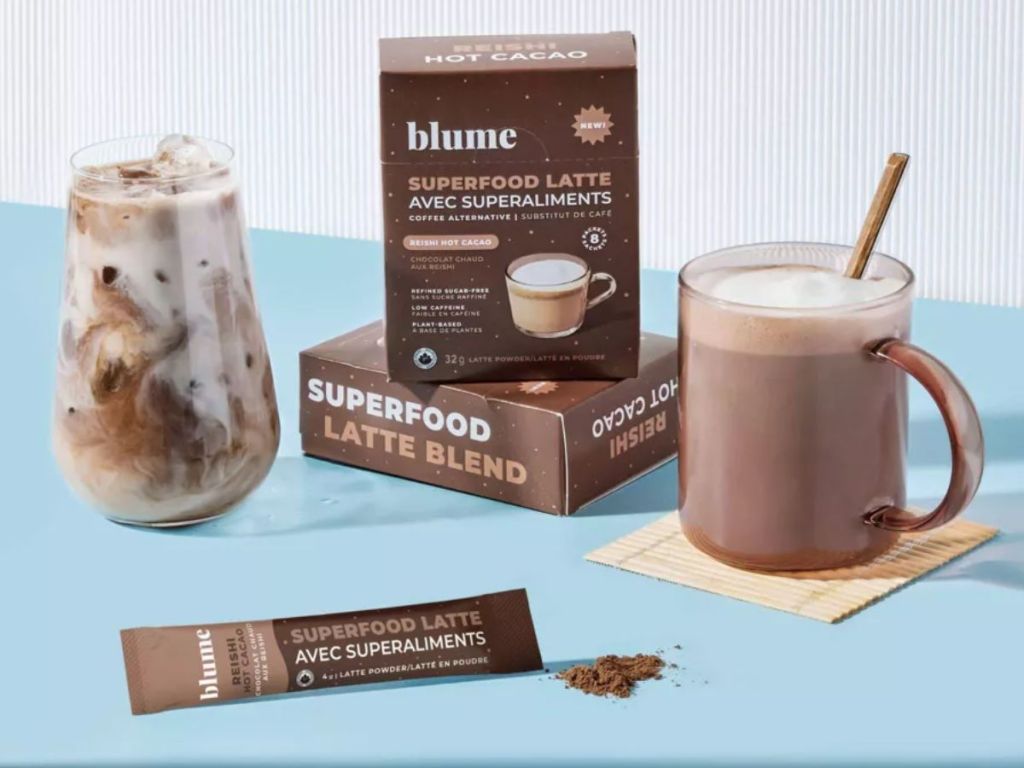 boxes of Blume Superfood Hot Cocoa, packet and cups of Hot Cocoa