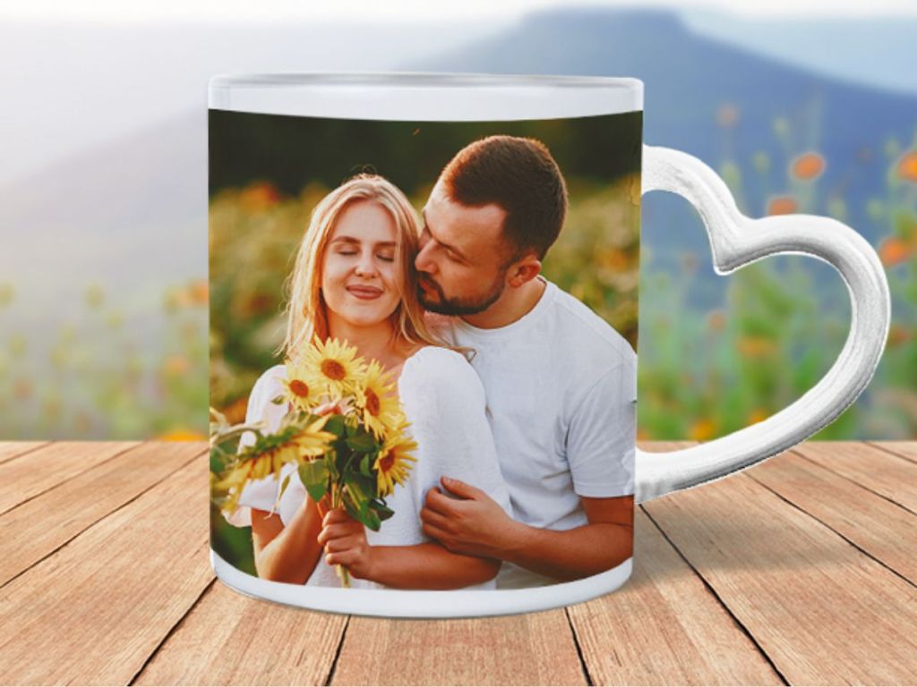 coffee mug with heart handle with photo of couple hugging