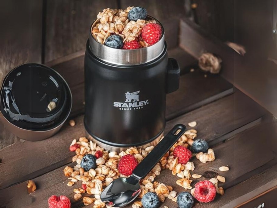 black Stanley food jar with spork with granola and berries