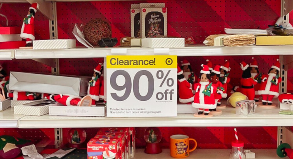 90% off of clearance sign display at target in front of their Christmas sale
