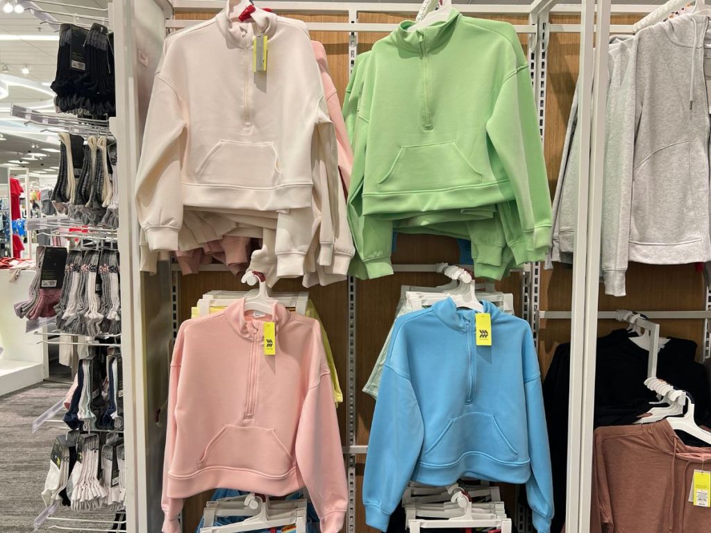 4 different colors of Target's All in Motion 1/2 Zip Pullover sweatshirts