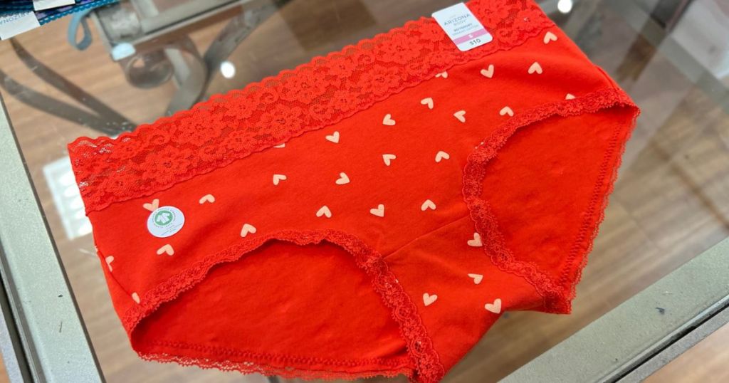 A pair of red arizona underwear with little hearts on them