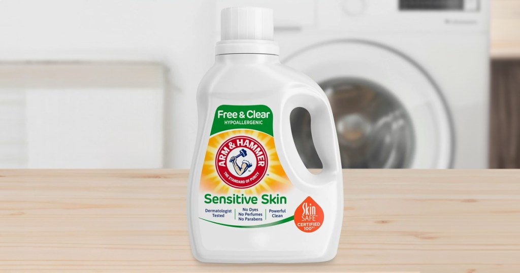 Arm & Hammer Sensitive Skin Free & Clear Laundry Detergent on a shelf in a laundry room