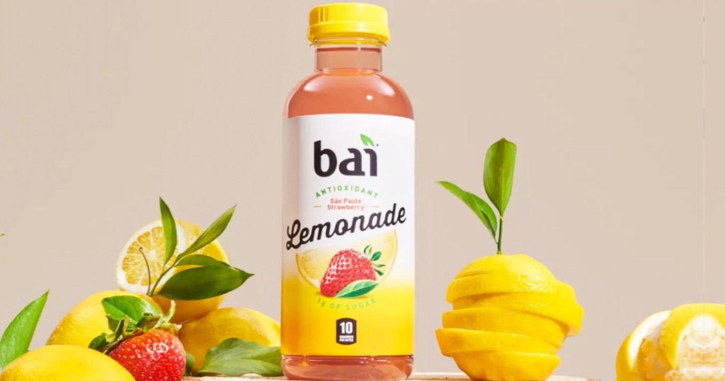 bottle of Bai São Paulo Strawberry Lemonade near cut lemons and strawberries