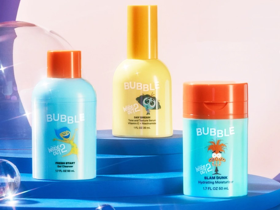 three Bubble skincare products with Inside Out characters on bottles