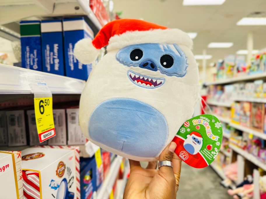 Bumble Holiday Squishmallow in hand in store