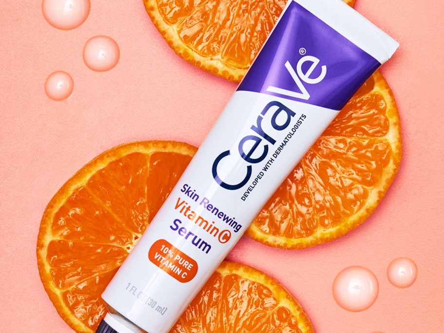 tube of CeraVe Vitamin C Serum on top of orange slices