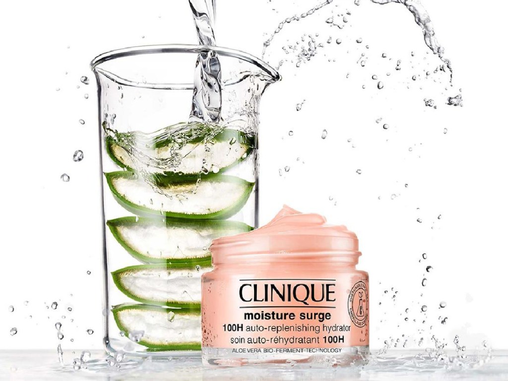 Clinique Moisture surge cream with a bottle of water with aloe inside of it