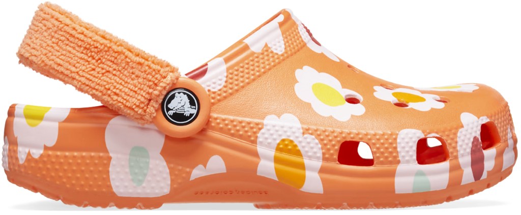 orange crocs clog with white flower print