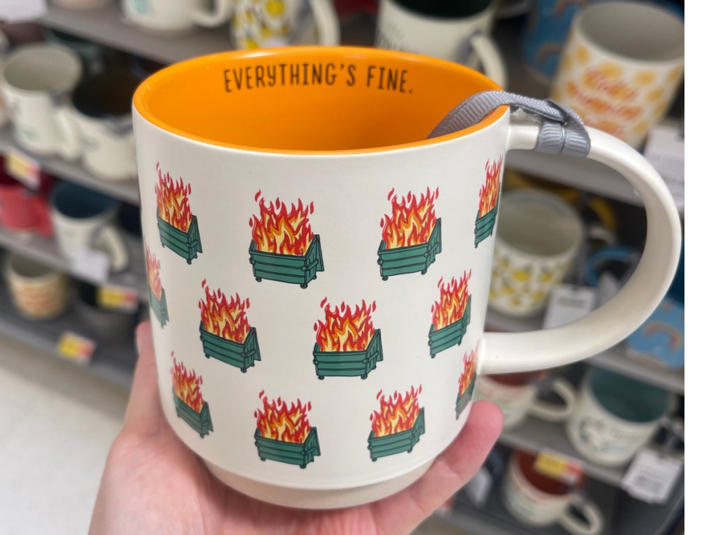 Everything is fine dumpster fire mug in walmart store