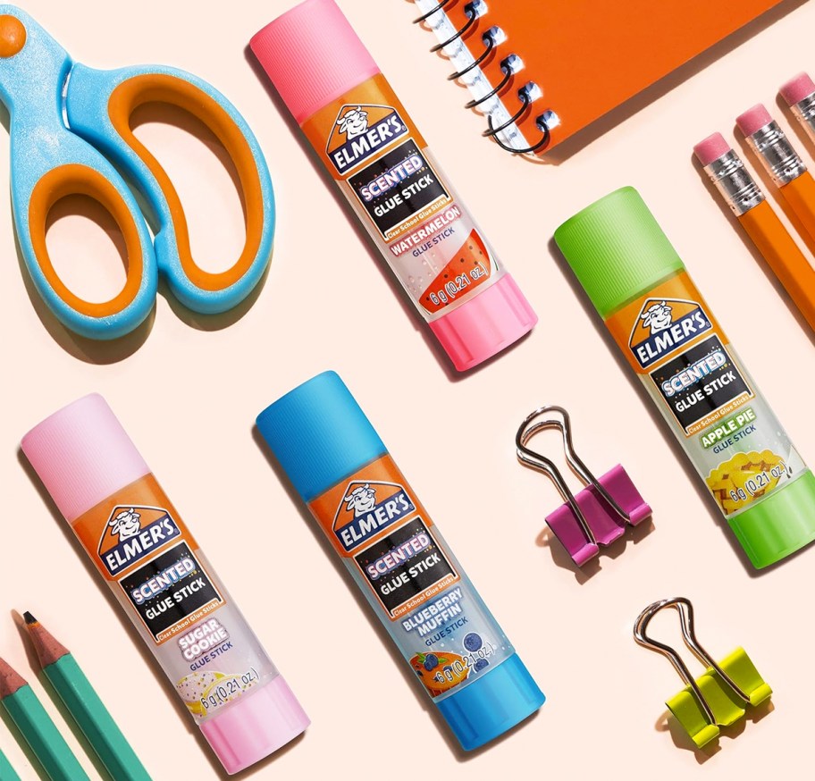 elmer's scented glue sticks on table with school supplies