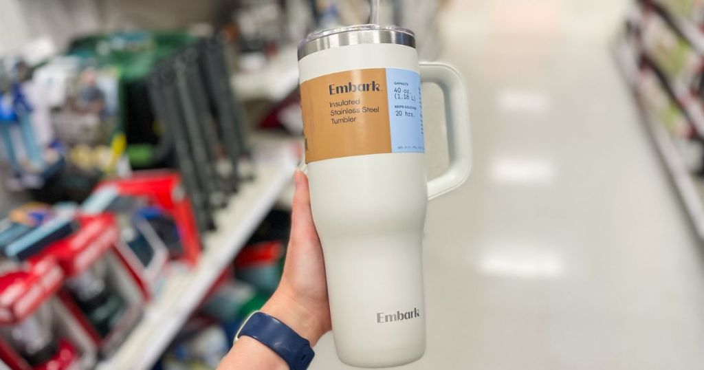 Hand holding up an Embark Stanley Tumbler Dupe Tumbler from Target