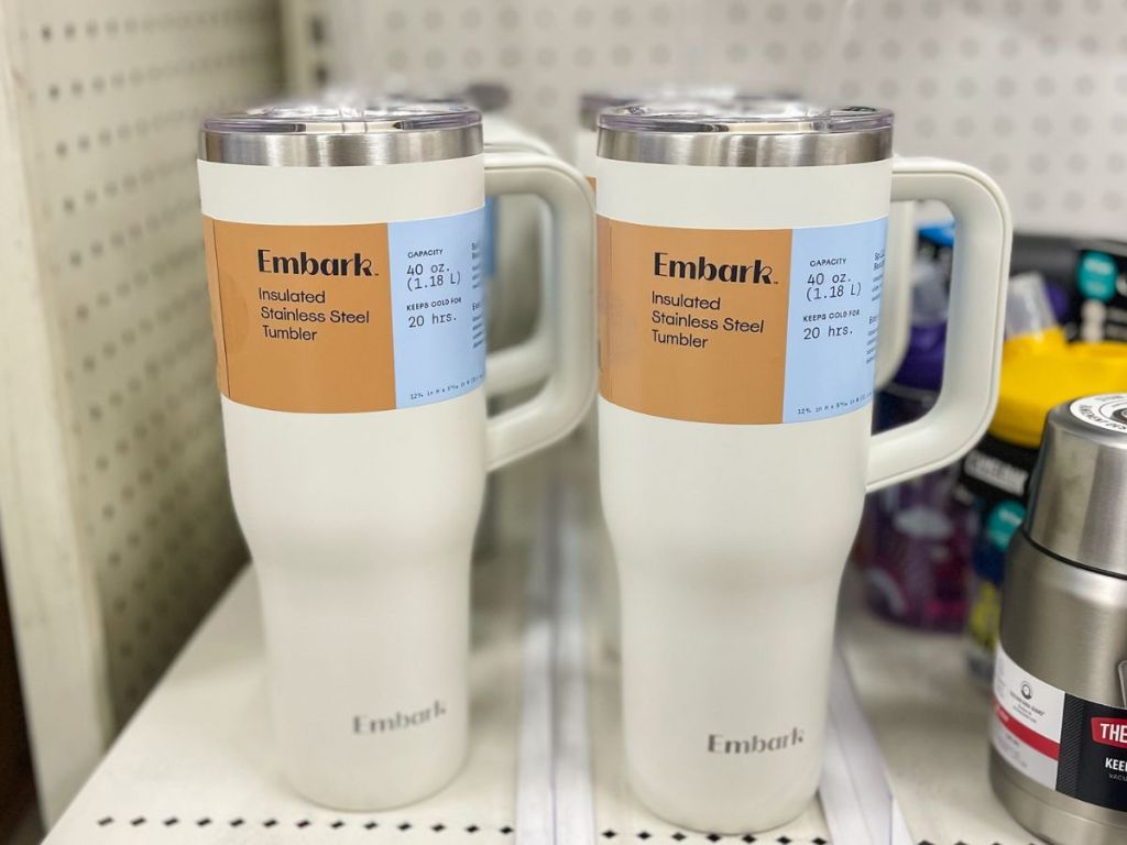 two white Embark tumblers on the shelf at Target