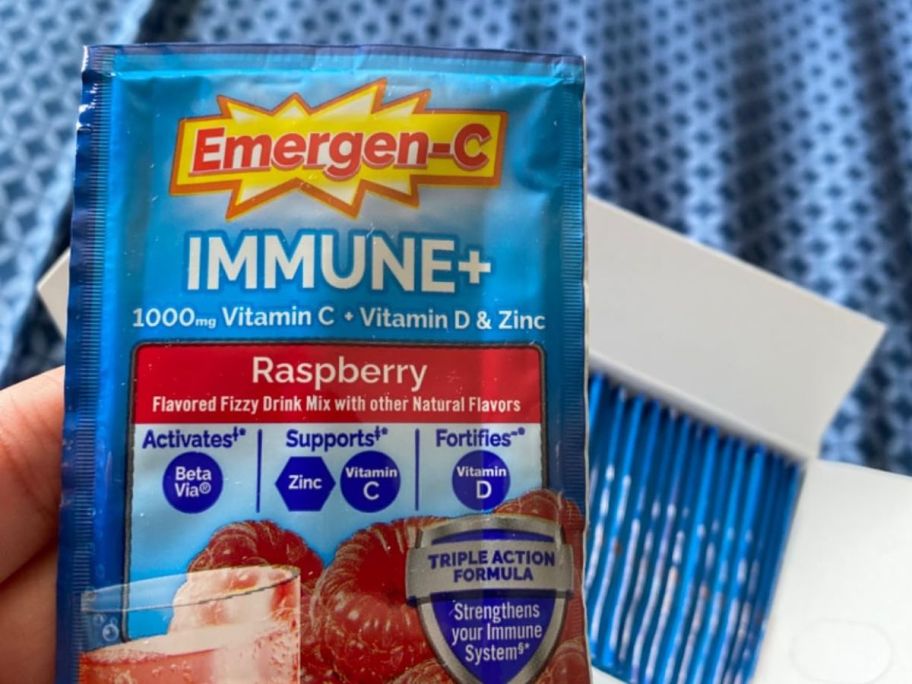 A blue packet of Emergen-C Immune+ Powder in Raspberry