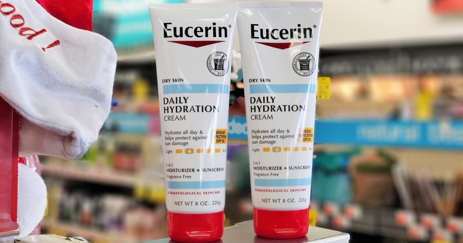 two tubes of Eucerin Daily Hydration SPF 30 Sunscreen Body Cream in store