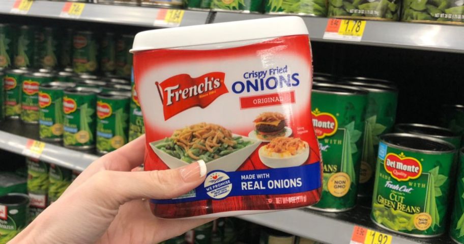 French's Crispy Fried Onions 6oz container in hand in store