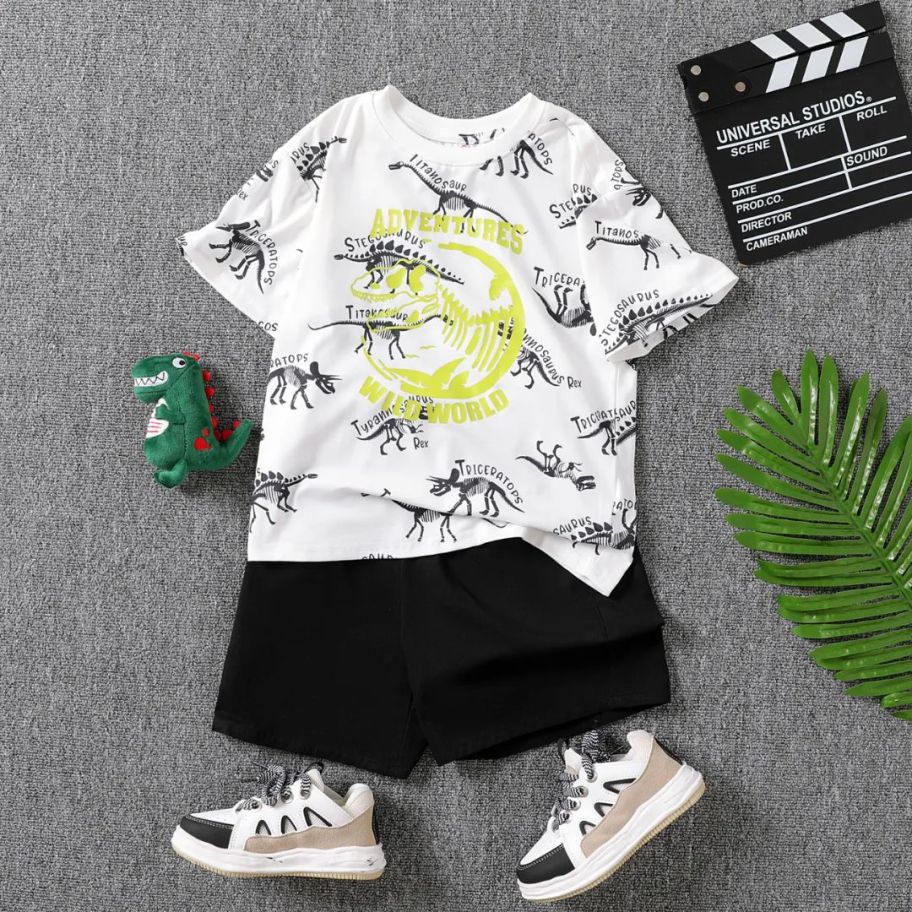 boys black and white tshirt with dinosaurs and black shorts 