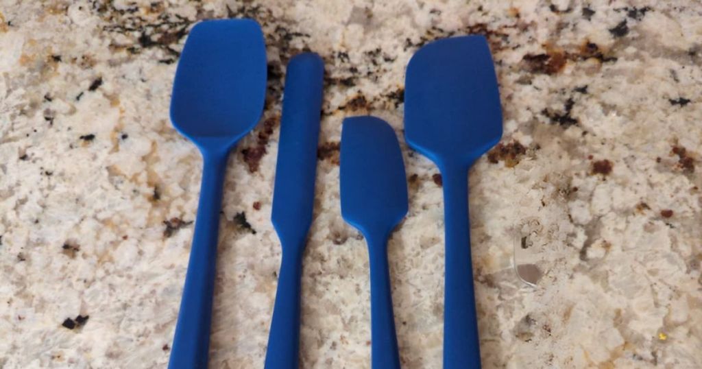 set of 4 blue silicone spatulas on counter