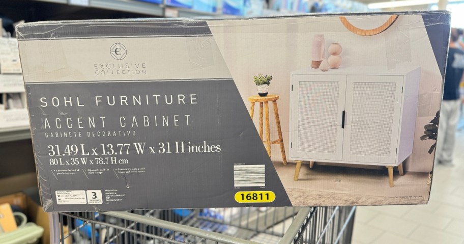 SOHL Furniture Accent Table white with rattan accents in a box on top of an ALDI shopping cart