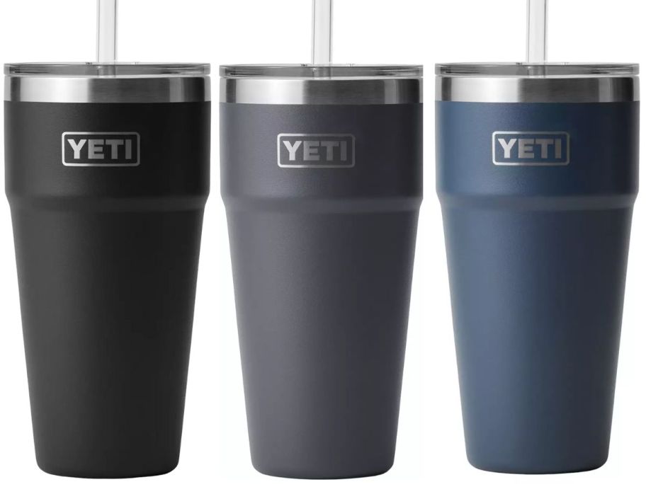 black, grey and navy blue YETI rambler cups with straws