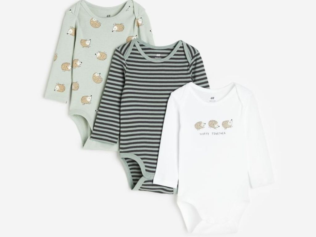 3 baby bodysuits in light green, stripes and white