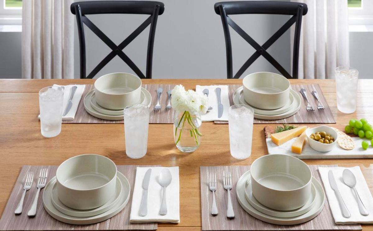 Home Decorators Collection Trenblay Coupe Melamine Dinnerware in beige set up on a dining table