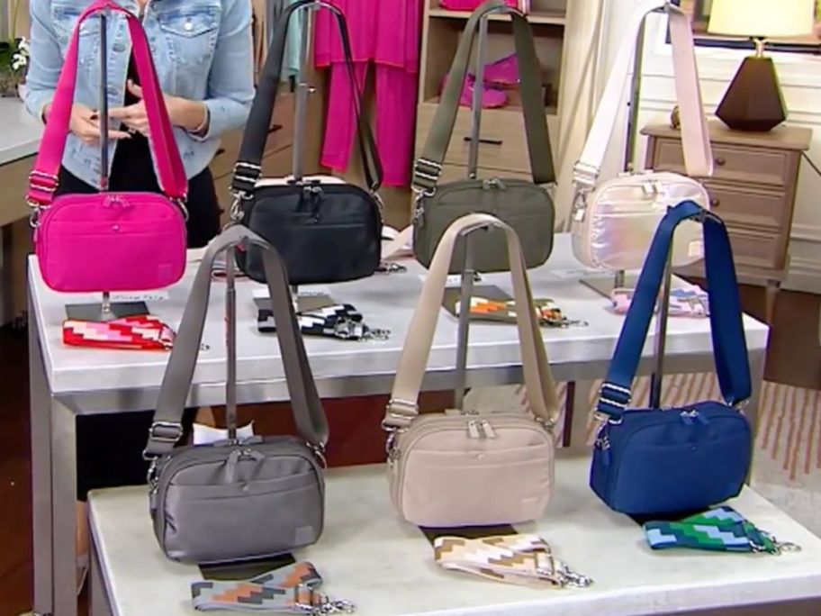 A table displaying IHKWIP Day to Day Convertible Crossbody bags in different colors