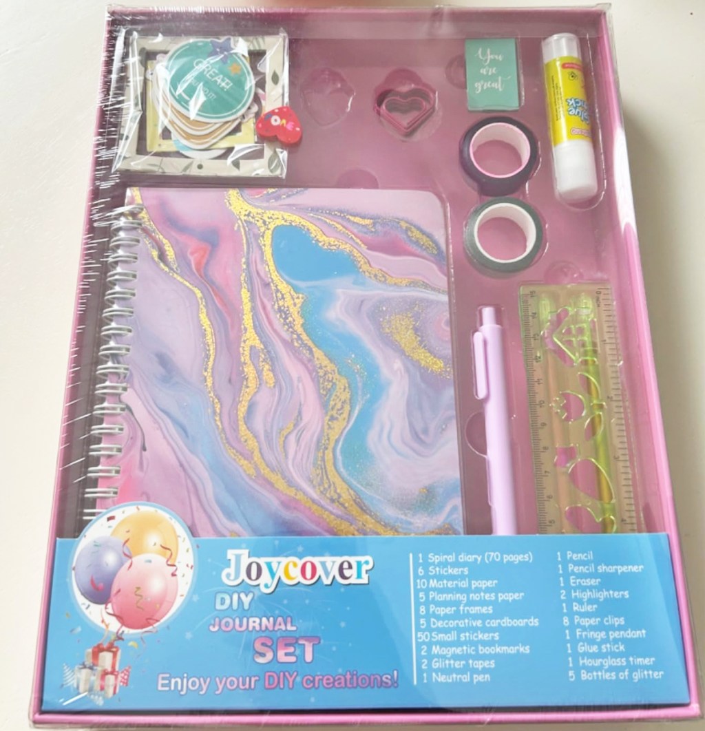 marble journal set with pens, tape, and stickers