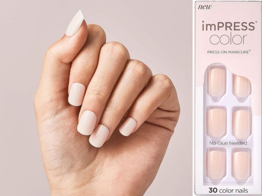 A woman wearing KISS imPRESS Mani Press On Nails in Point Pink