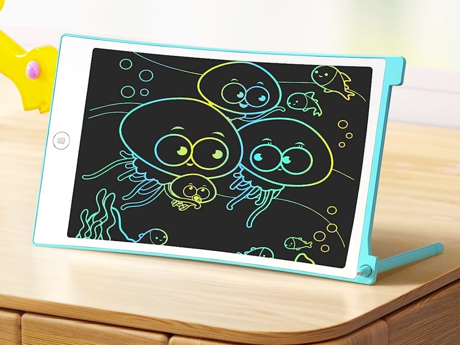 blue and white kids doodle board with drawings of jellyfish