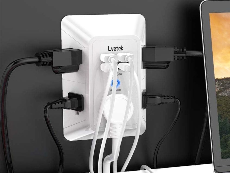 multiple cords plugged into outlet extender