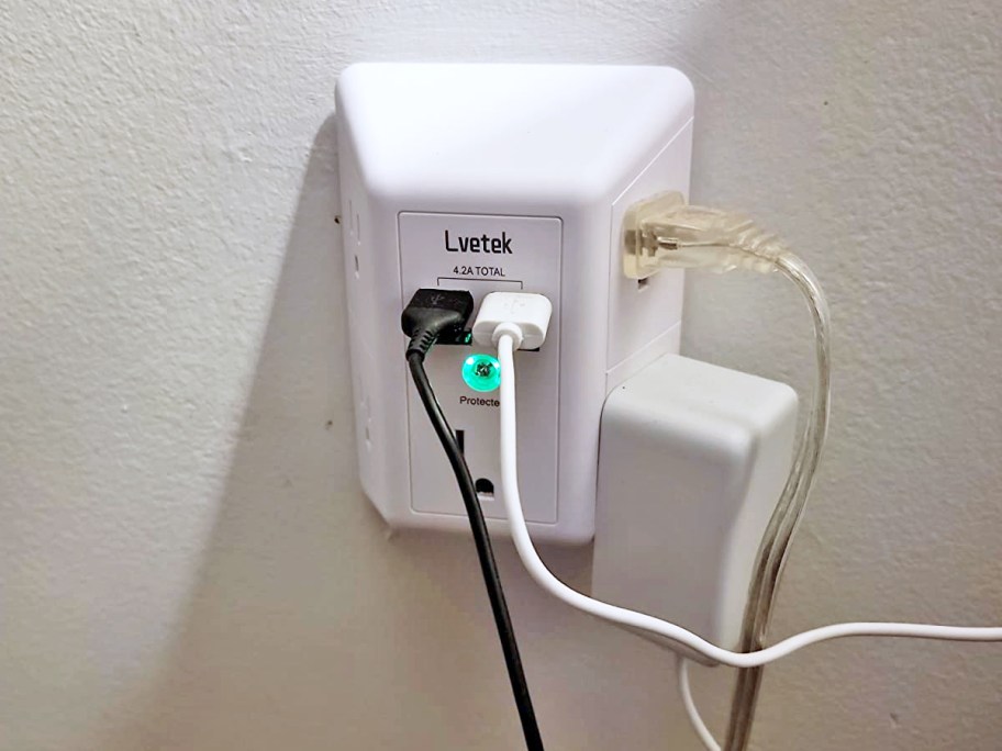 multiple cords plugged into outlet extender