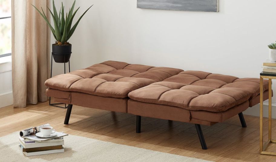 a brown faux suede futon 