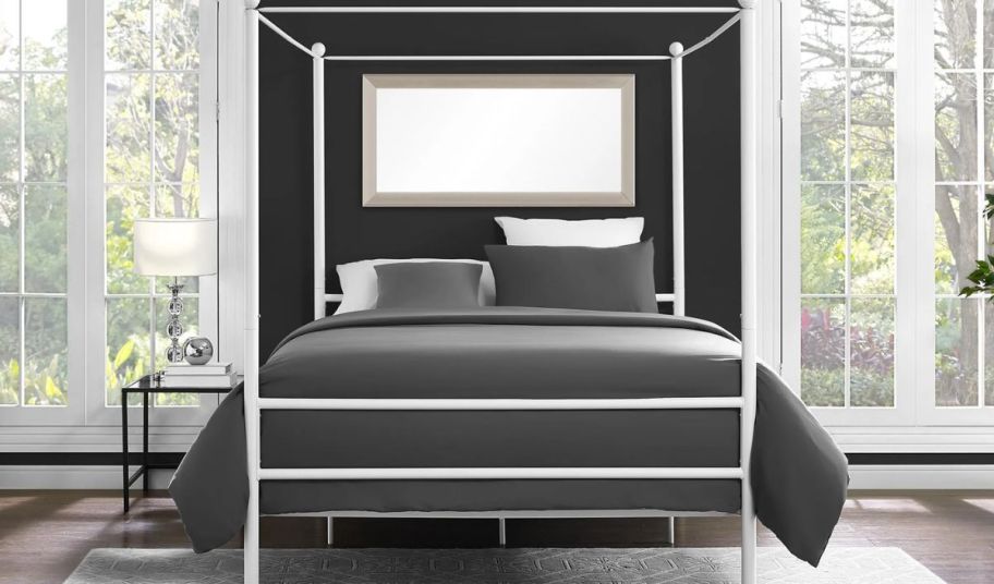a Metal Canopy Bed in Off White