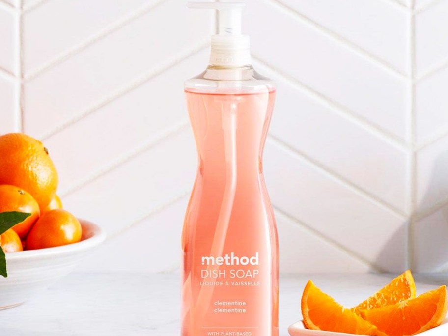 orange bottle of dish soap on kitchen counter