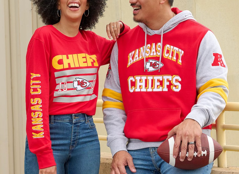 man and women in NFL chiefs shirts