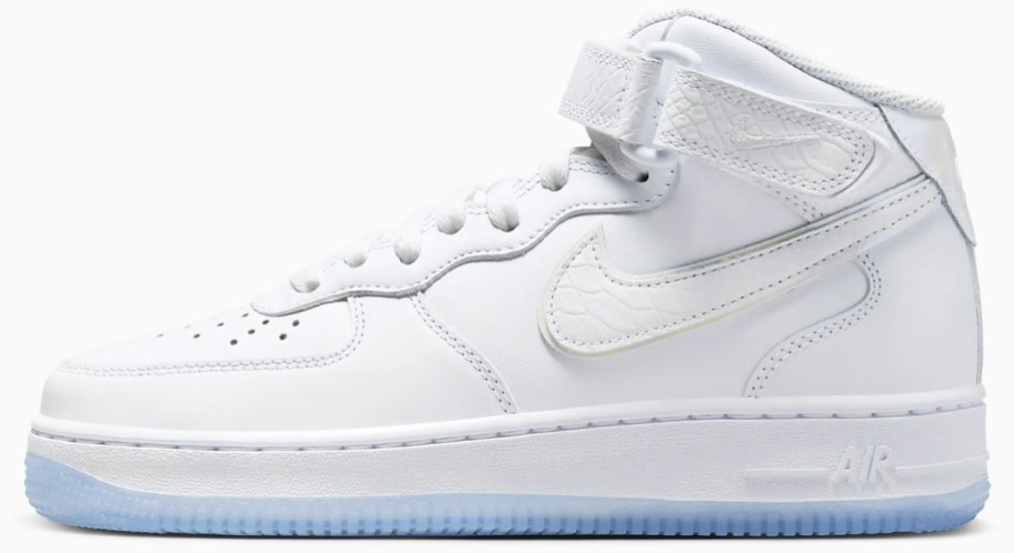 white nike sneaker with light blue sole